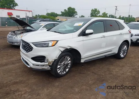 2022 Ford Edge Titanium z USA, uszkodzony, nr VIN 2FMPK4K9XNBA17689